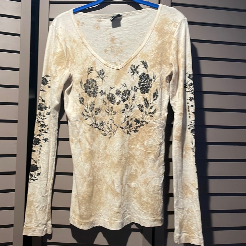 Womens shirts. Both Medium. Both in good condition